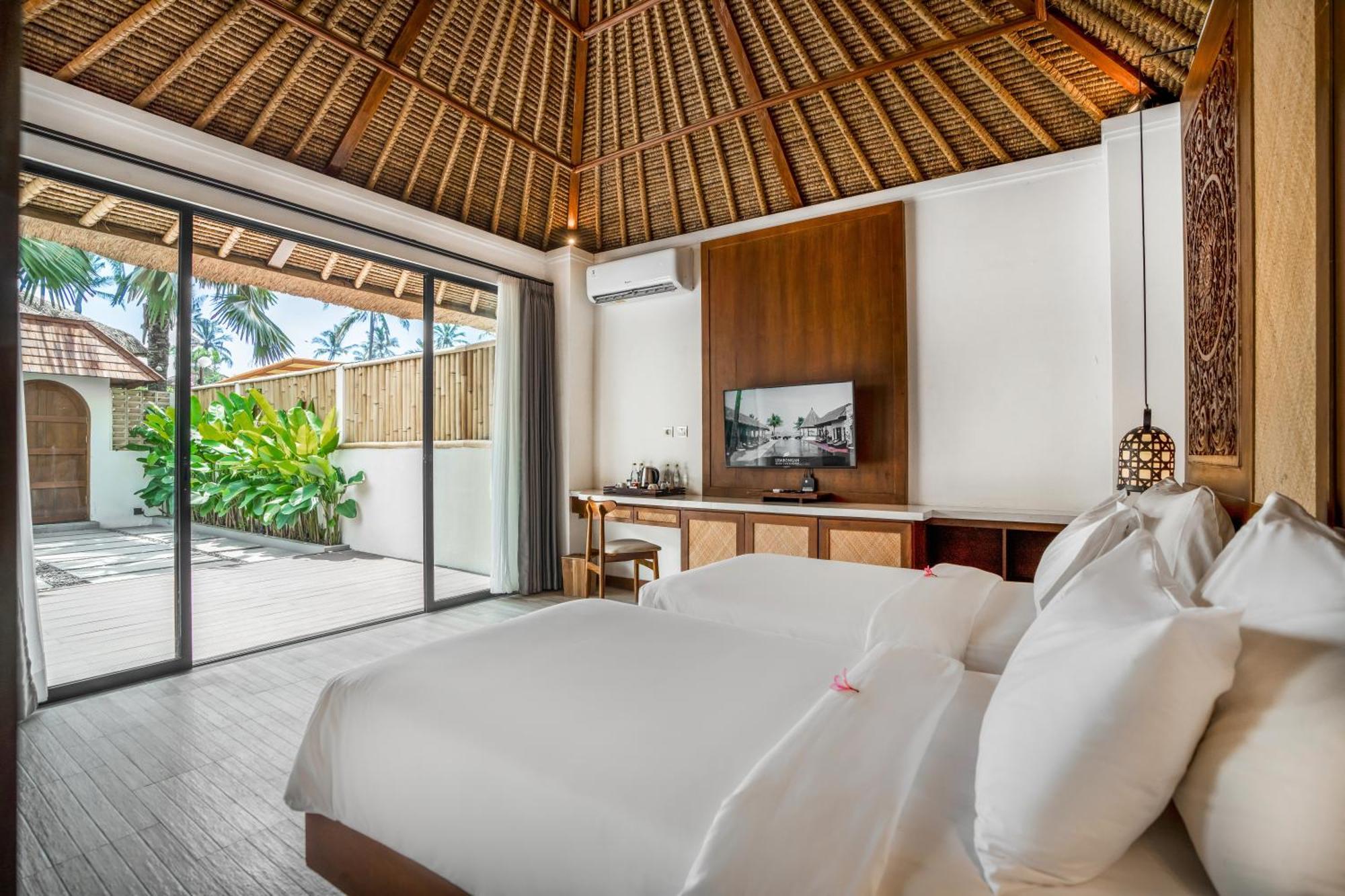 Candidasa Nirwana Beach & Resort מראה חיצוני תמונה Deluxe Beachfront Villa